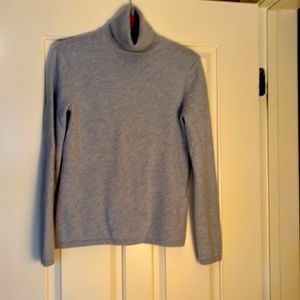 100%cashmere sweater in light blue size medium.
